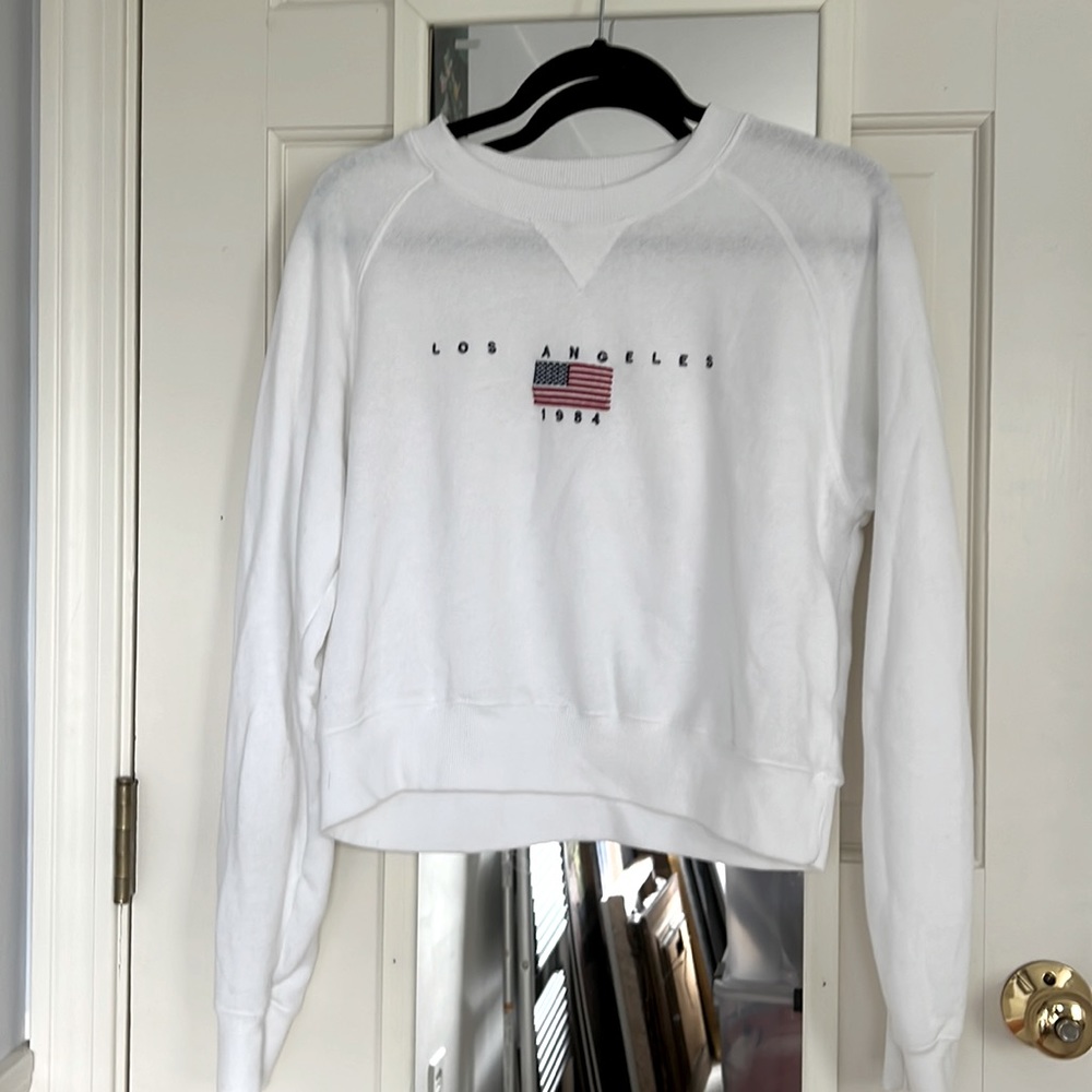 Brandy Melville white Los Angeles American flag 1984 sweatshirt - John Galt